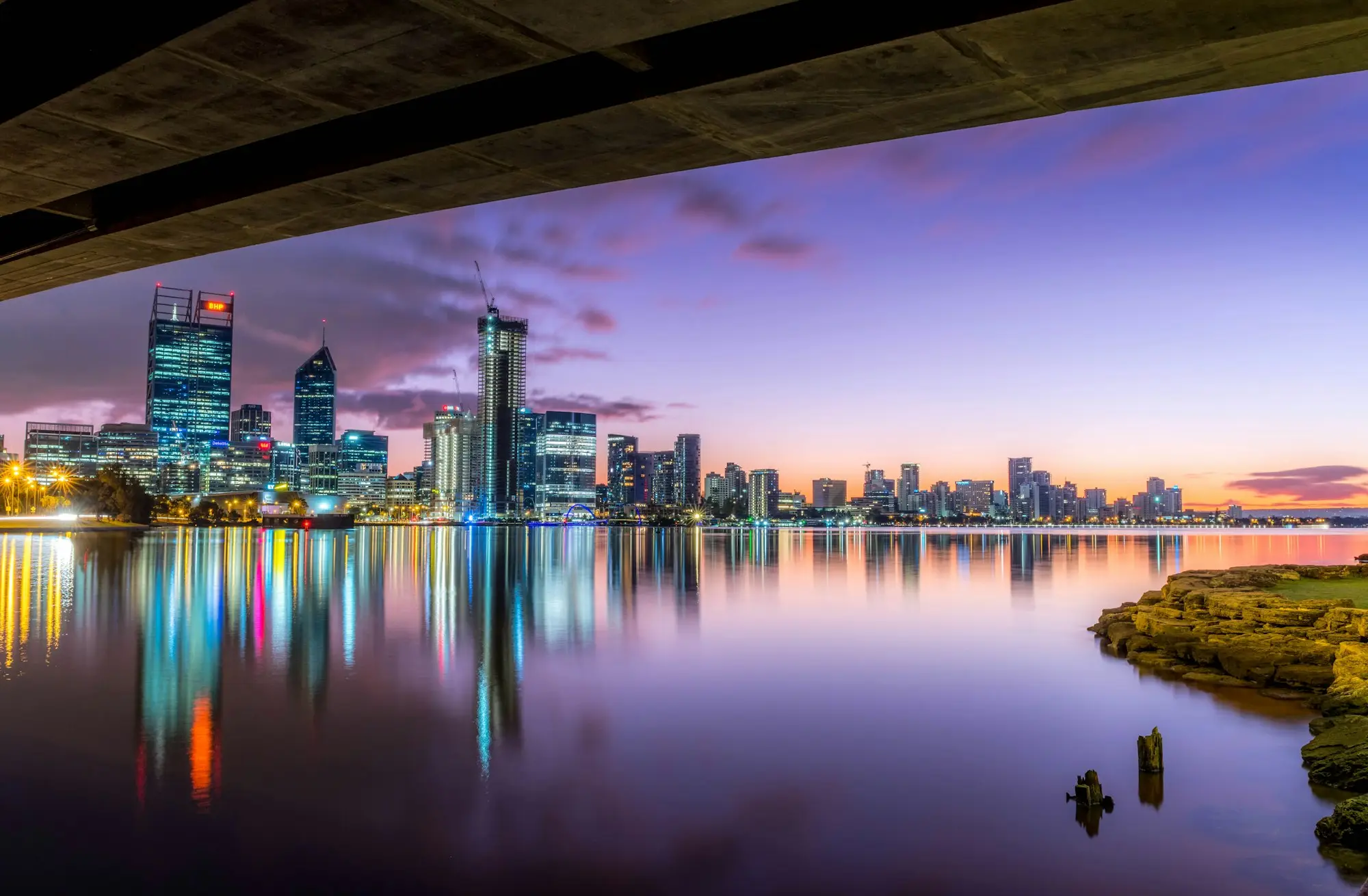 Perth city skyline reflected in the Swan River at dusk