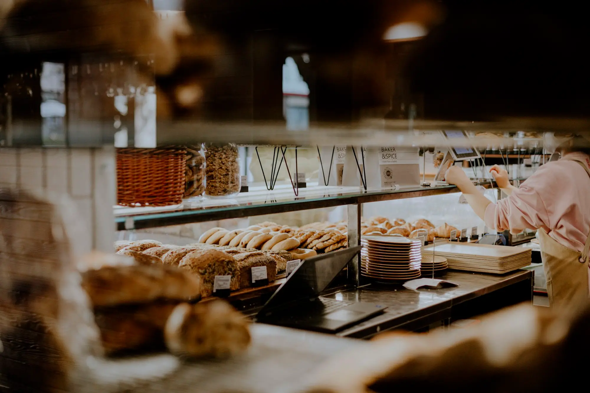 Country bakery counter stocked with fresh bread and pastries