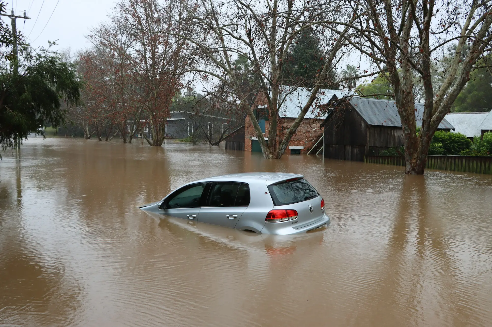 Floodwater through a street in Windsor, New South Wales